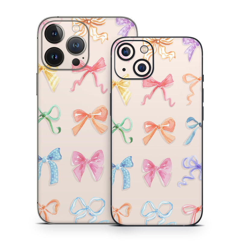 iPhone 13 Series Skin design of Pink, Ribbon, Bow tie, Party Supply, Knot, Hair tie, with pink, orange, yellow, red, green, blue, purple colors