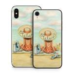Relaxing on Beach iPhone X Series Skin