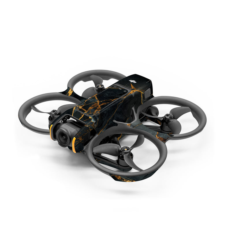 DJI Avata 2 Skin design of Atmosphere, Twig, World, Branch, Vegetation, Wood, Rectangle, Landscape, Slope, Geological phenomenon, with black, brown, yellow, gray, white colors