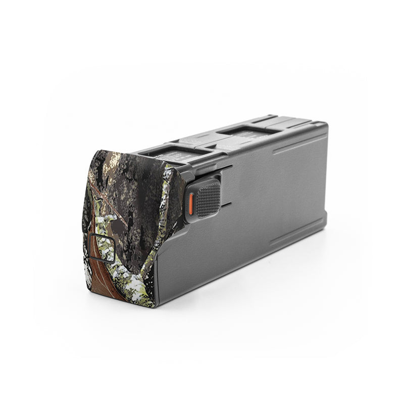 DJI Avata 2 Battery Skin design of Leaf, Tree, Plant, Adaptation, Camouflage, Branch, Wildlife, Trunk, Root, with black, gray, green, red colors