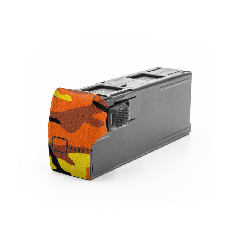 DJI Avata 2 Battery Skin design of Military camouflage, Orange, Pattern, Camouflage, Yellow, Brown, Uniform, Design, Tree, Wildlife, with red, green, black colors