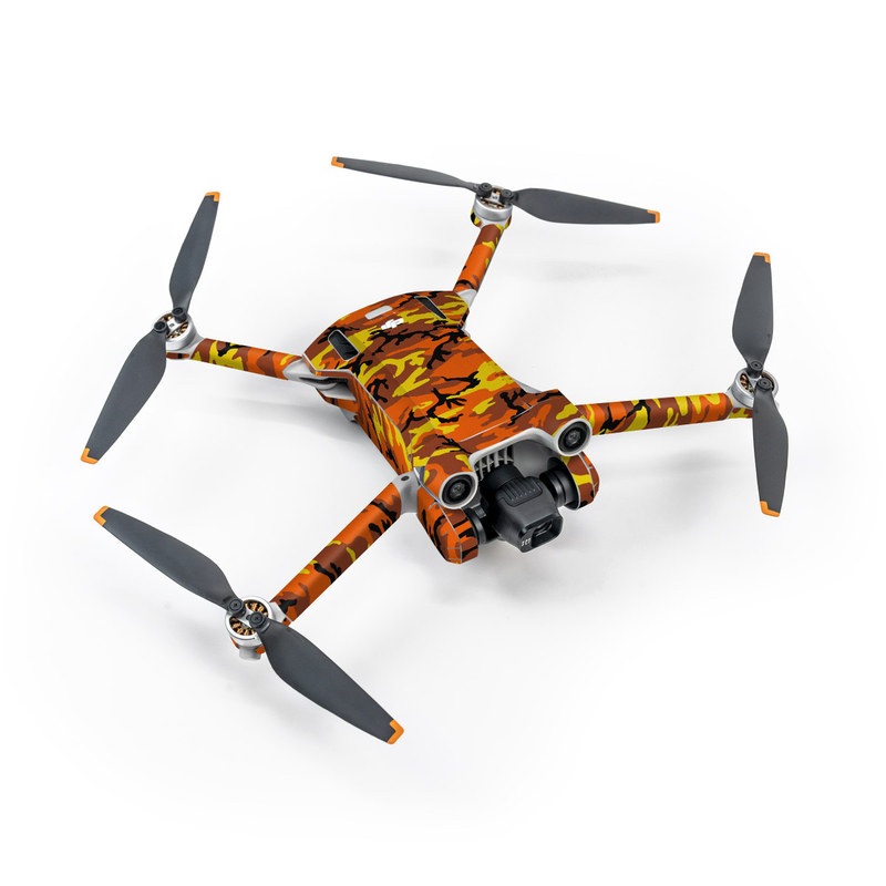 DJI Mini 3 Pro Skin design of Military camouflage, Orange, Pattern, Camouflage, Yellow, Brown, Uniform, Design, Tree, Wildlife with red, green, black colors