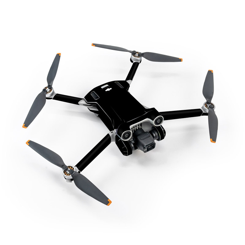 DJI Mini 3 Pro Skin design of Black, Darkness, White, Sky, Light, Red, Text, Brown, Font, Atmosphere with black colors
