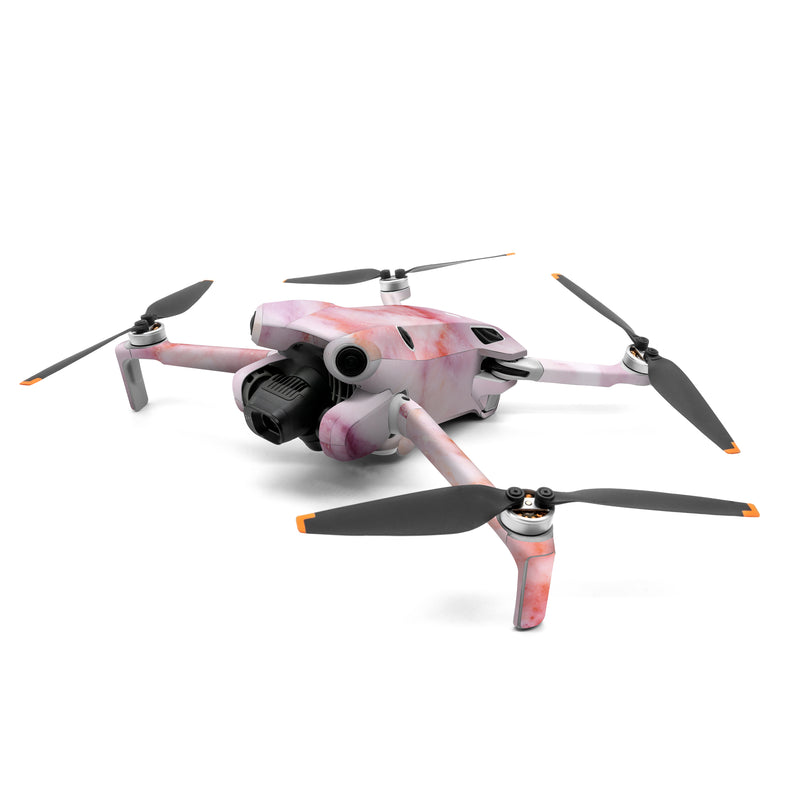 DJI Mini 4 Pro Skin design of Pink, Skin, Flesh, Textile, Fur, with pink, red, white, purple, orange colors