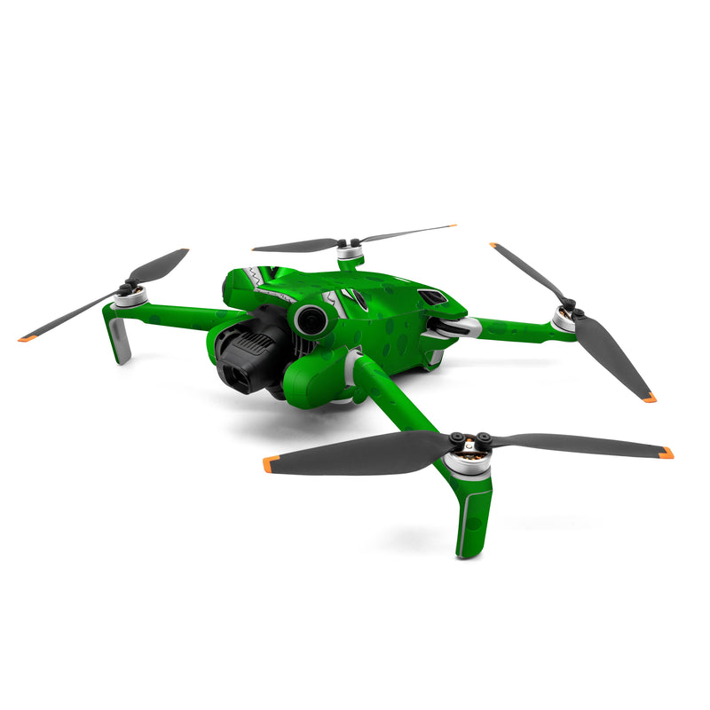 DJI Mini 4 Pro Skin design of Green, Font, Animation, Logo, Graphics, Games, with green, white colors