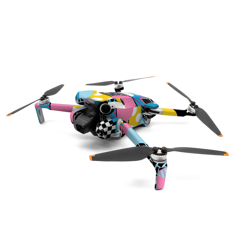 DJI Mini 4 Pro Skin design of White, Yellow, Art, Font, Pattern, Circle, Design, Creative arts, Graphics, Electric blue, with blue, pink, white, black, yellow colors