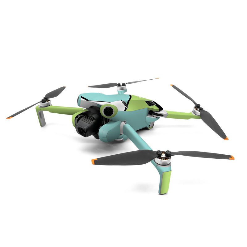 DJI Mini 4 Pro Skin design of Green, Line, Blue, Triangle, Design, Parallel, Pattern, Graphic design, Slope, with white, black, green, blue colors