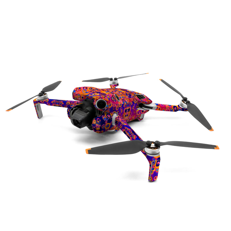DJI Mini 4 Pro Skin design of Pattern, Psychedelic art, Symmetry, with orange, purple, blue, pink colors