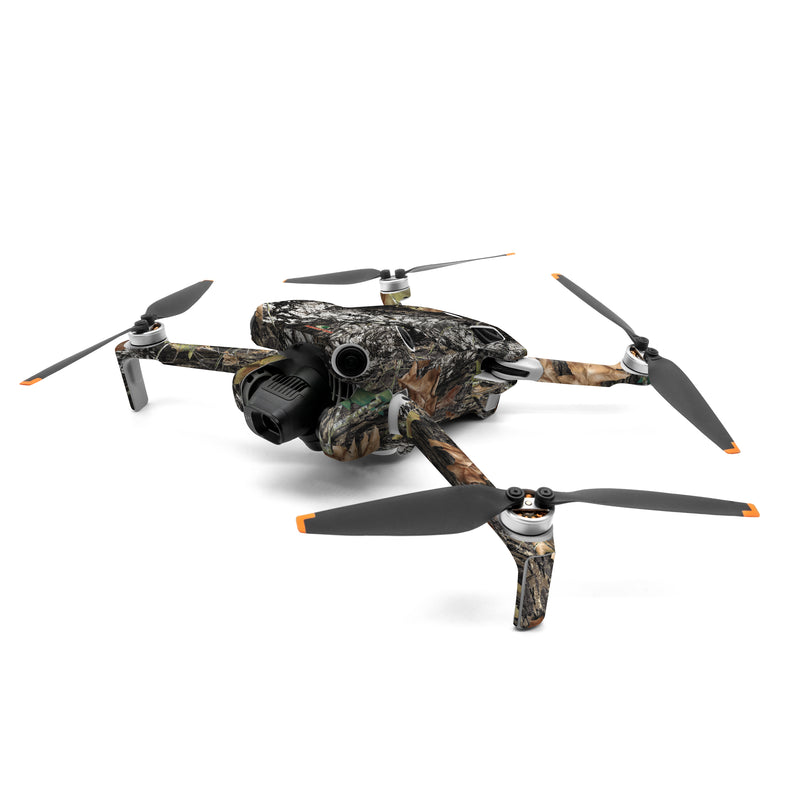 DJI Mini 4 Pro Skin design of Leaf, Tree, Plant, Adaptation, Camouflage, Branch, Wildlife, Trunk, Root, with black, gray, green, red colors