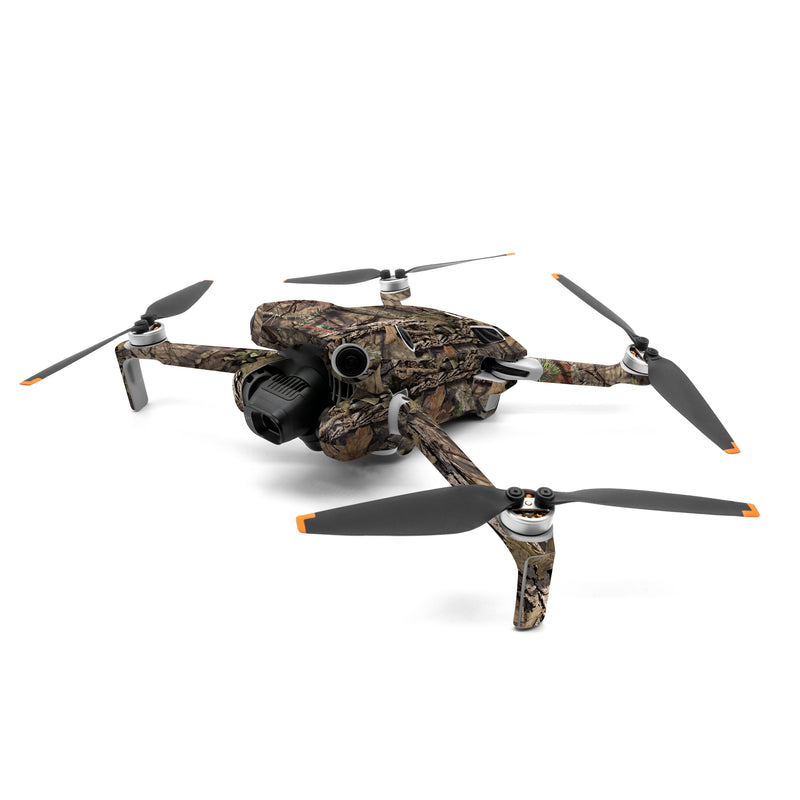 DJI Mini 4 Pro Skin design of shellbark hickory, Camouflage, Tree, Branch, Trunk, Plant, Leaf, Adaptation, Wood, Twig, with orange, green, red, black, gray colors