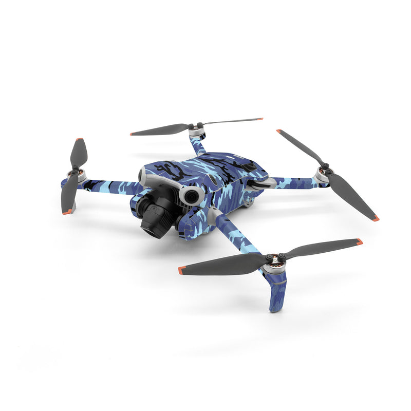 DJI Mini 4 Pro Skin design of Military camouflage, Pattern, Blue, Aqua, Teal, Design, Camouflage, Textile, Uniform, with blue, black, gray, purple colors