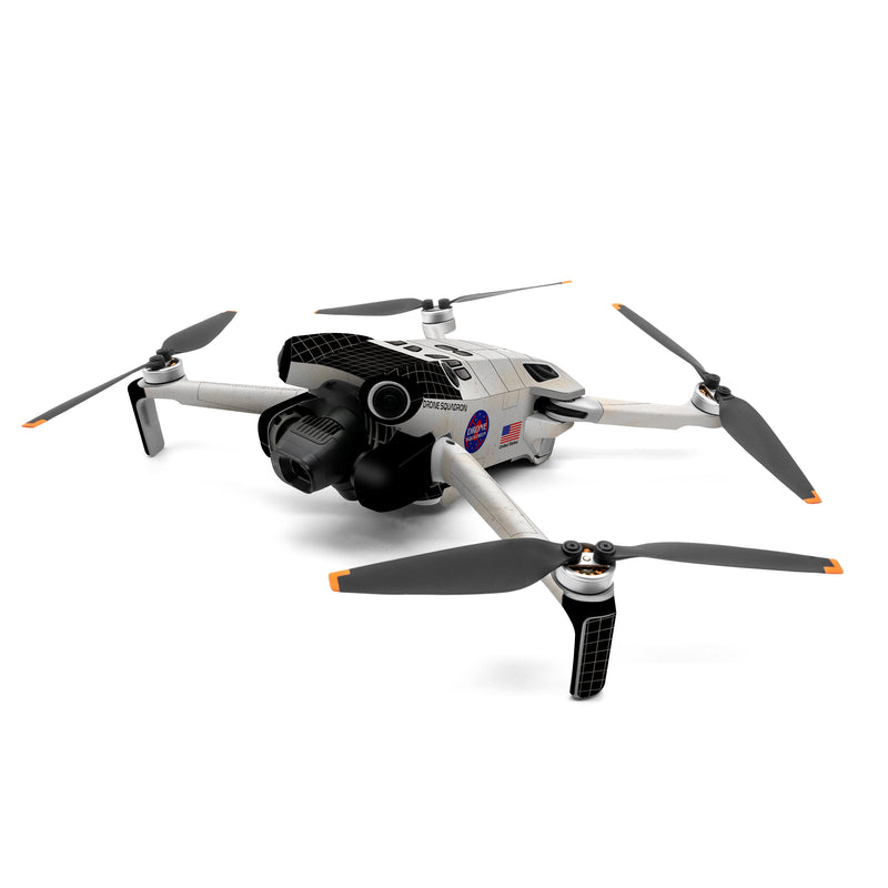 DJI Mini 4 Pro Skin design of Logo, Graphics, Graphic design, with black, white, red, blue, brown colors