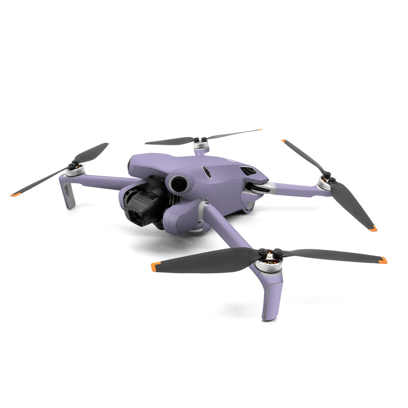 DJI Mini 4 Pro Skin design of Purple, Violet, Electric blue, Font, Pattern, Magenta, Sky, Event, Circle, Cumulus, with purple colors