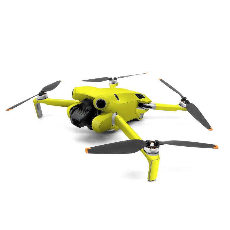 DJI Mini 4 Pro Skin design of Yellow, Font, Electric blue, Peach, Pattern, Magenta, with yellow colors