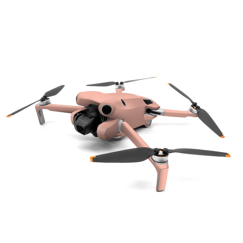 DJI Mini 4 Pro Skin design of Orange, Pink, Peach, Brown, Red, Yellow, Material property, Font, Beige, with orange, yellow, white colors