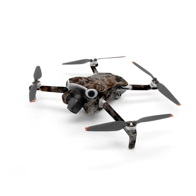 DJI Mini 4 Pro Skin design of Brown, Design, Soil, Pattern, Rock, Rust, Granite, Metal, with black, white, gray, brown colors