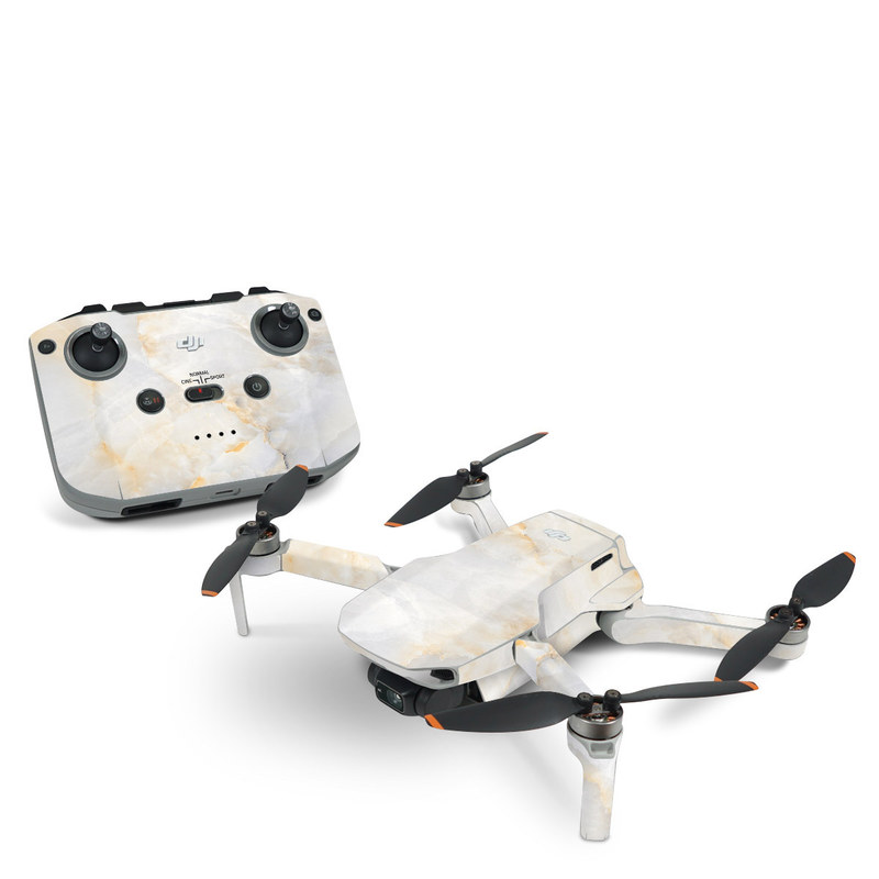 DJI Mini 2 Skin design of White, Textile, Flooring, Marble, Paper, Pattern, Fashion accessory, Tile, with white, orange, black, yellow colors
