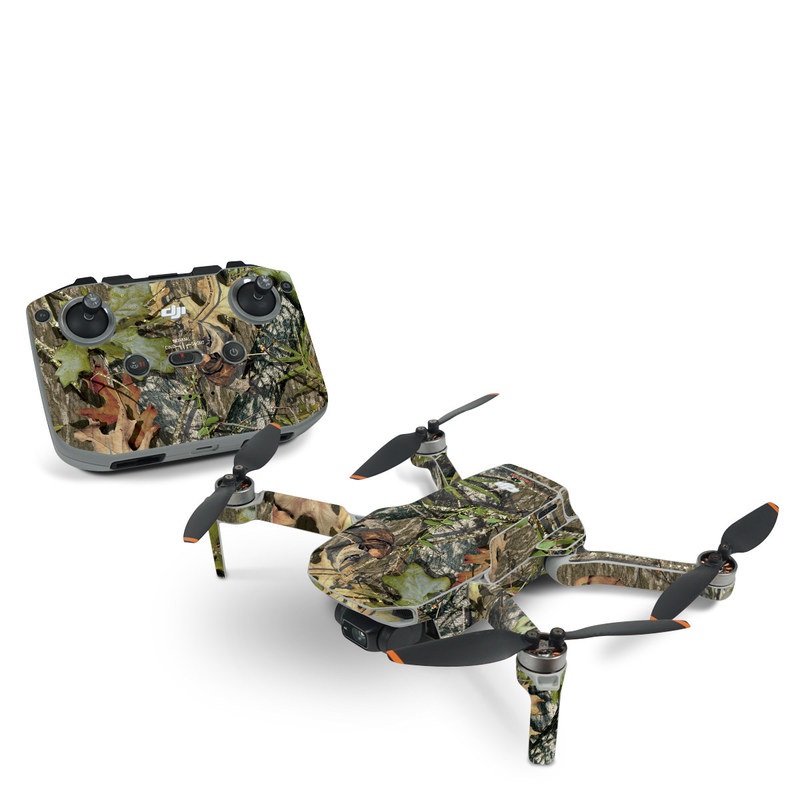 DJI Mini 2 Skin design of Camouflage, Military camouflage, Tree, Plant, Leaf, Design, Adaptation, Branch, Pattern, Trunk, with black, green, gray, red colors