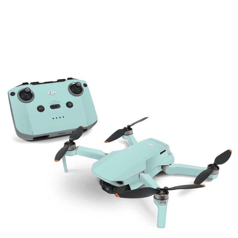 DJI Mini 2 Skin design of Green, Blue, Aqua, Turquoise, Teal, Azure, Text, Daytime, Yellow, Sky, with blue colors