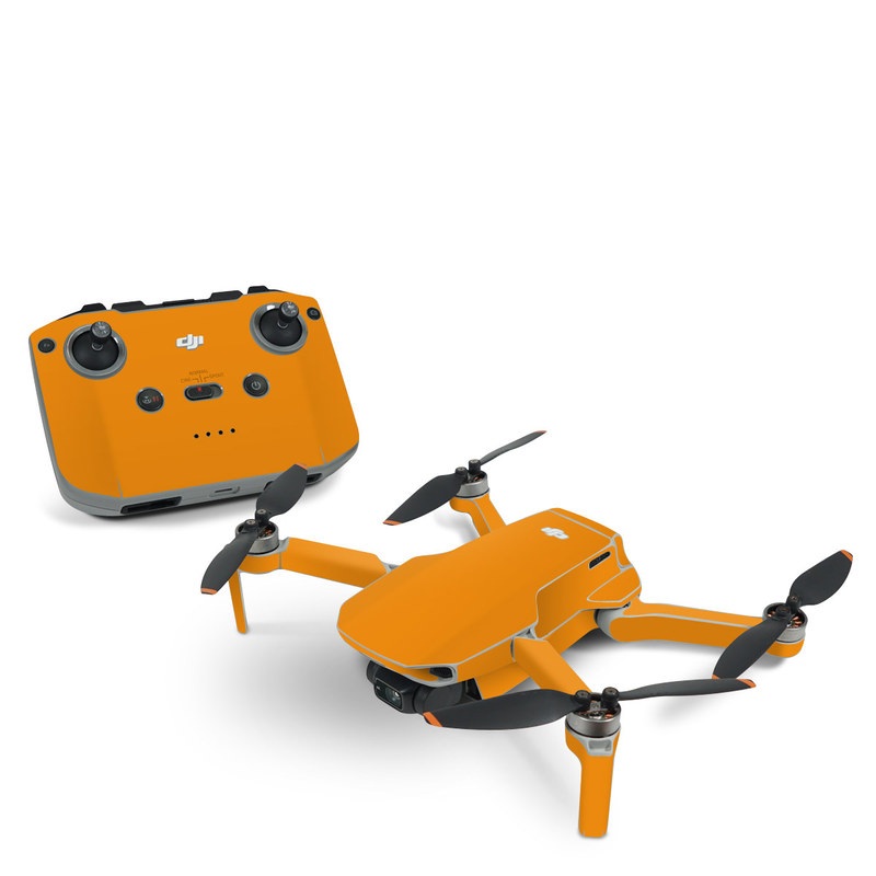 DJI Mini 2 Skin design of Orange, Yellow, Brown, Text, Amber, Font, Peach, with orange colors