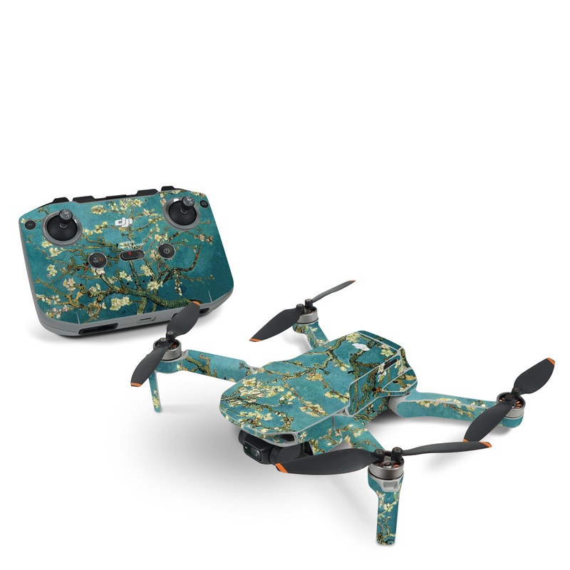 DJI Mini 2 Skin design of Tree, Branch, Plant, Flower, Blossom, Spring, Woody plant, Perennial plant, with blue, black, gray, green colors