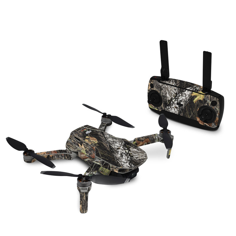 DJI Mini SE Skin design of Leaf, Tree, Plant, Adaptation, Camouflage, Branch, Wildlife, Trunk, Root, with black, gray, green, red colors