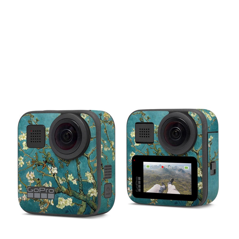 GoPro Max Skin design of Tree, Branch, Plant, Flower, Blossom, Spring, Woody plant, Perennial plant, with blue, black, gray, green colors
