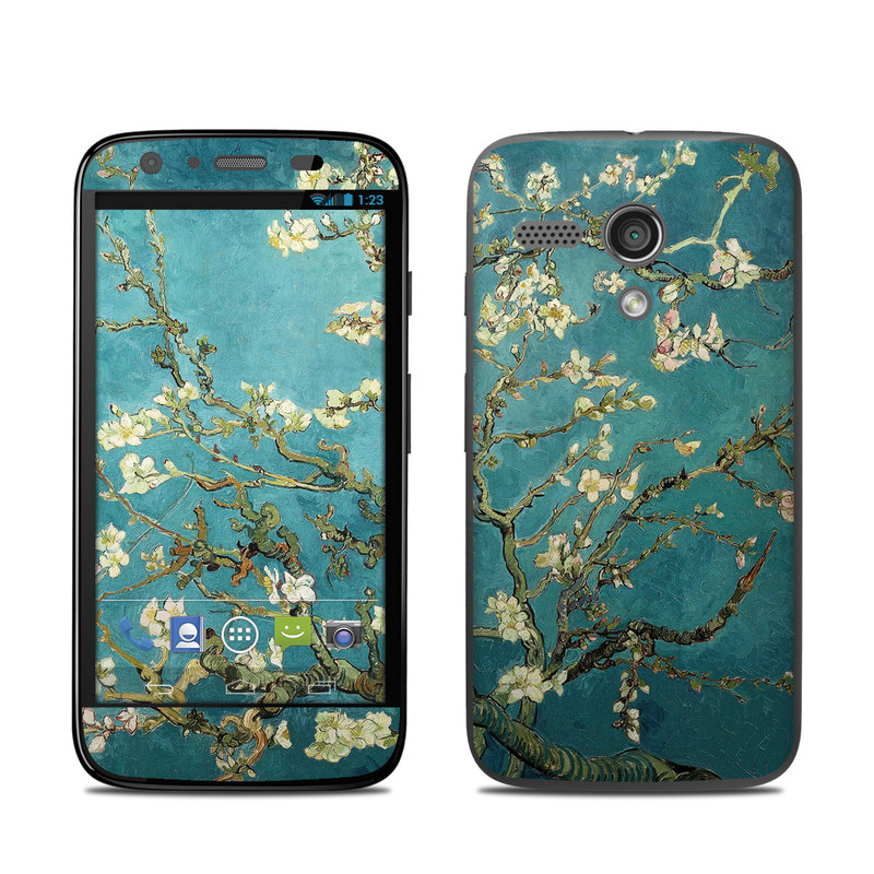 Motorola Moto G Skin design of Tree, Branch, Plant, Flower, Blossom, Spring, Woody plant, Perennial plant, with blue, black, gray, green colors