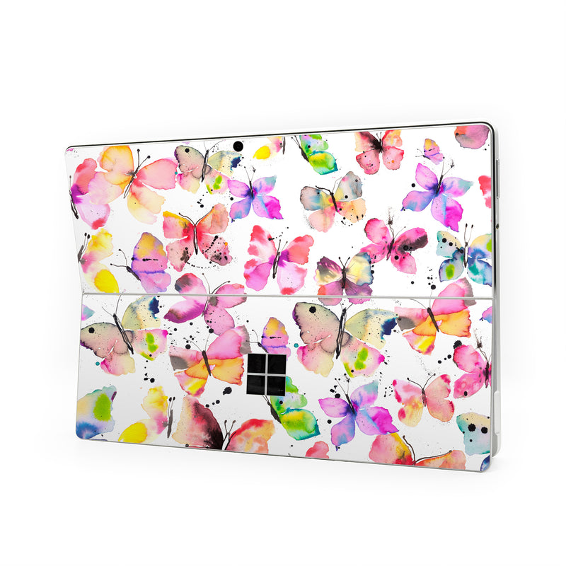 Microsoft Surface Pro Series Skin design of Pollinator, Butterfly, Pink, Insect, Lepidoptera, Arthropod, Paint, Watercolor painting, with white, pink, red, blue, green, purple, yellow, orange colors