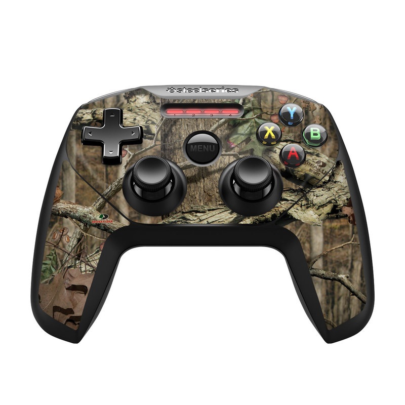 SteelSeries Nimbus Controller Skin design of Tree, Military camouflage, Camouflage, Plant, Woody plant, Trunk, Branch, Design, Adaptation, Pattern, with black, red, green, gray colors